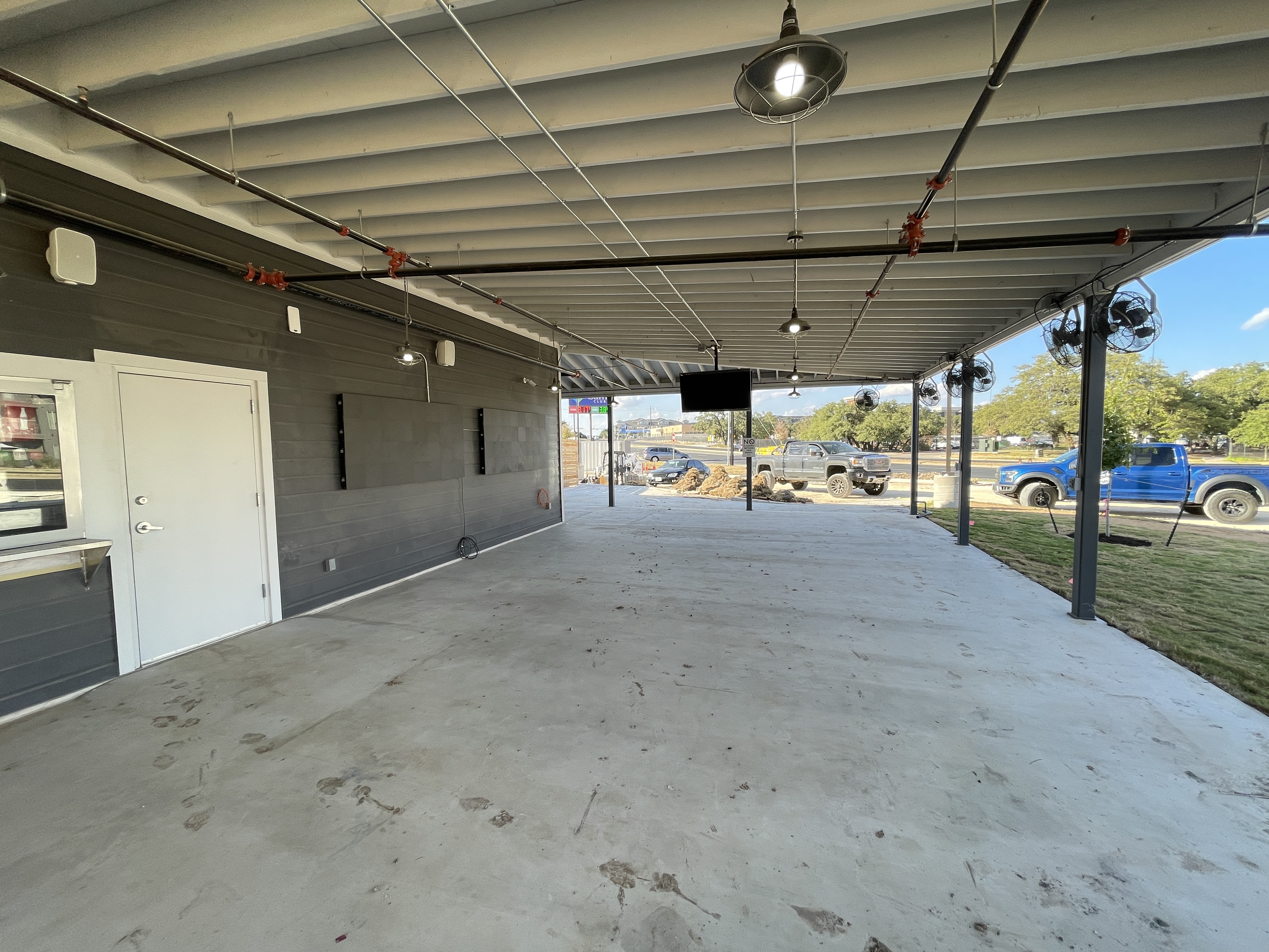 Installed television display at Mutts K9 Cantina